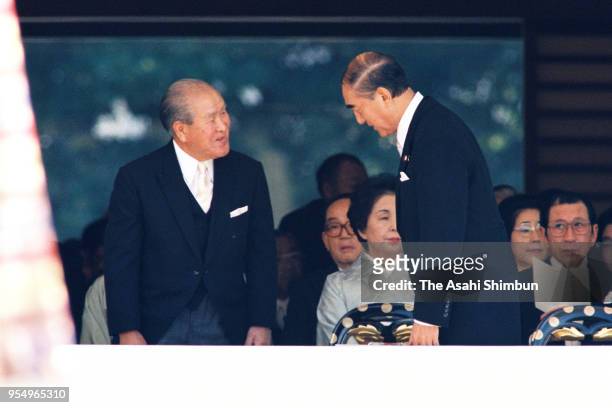 Former Japanese Prime Ministers Zenko Suzuki and Yasuhiro Nakasone greet prior to the 'Seiden-no-Gi' of the 'Sokui-no-Rei', Emperor's Enthronement...