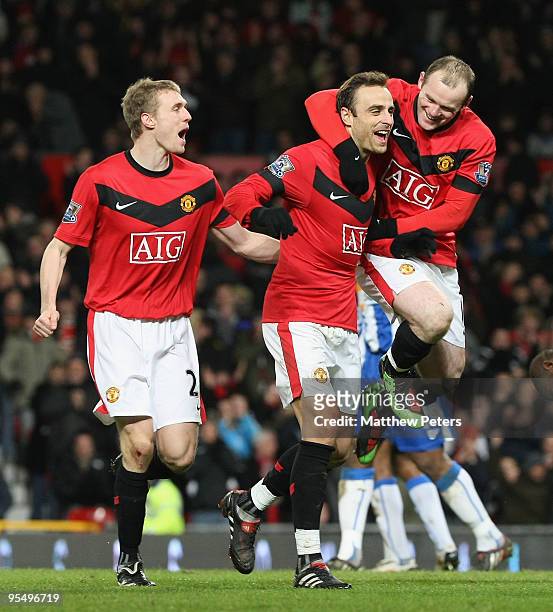 Dimitar Berbatov of Manchester United celebrates scoring their fourth goal during the Barclays Premier League match between Manchester United and...