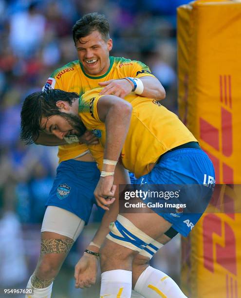 Johnny Kotze a celebrate with Lood de Jager of the Bulls after scoring a try during the Super Rugby match between DHL Stormers and Vodacom Bulls at...