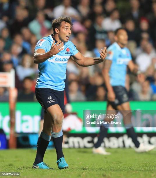 Nick Phipps of the Waratahs gestures to team mates during the round 12 Super Rugby match between the Waratahs and the Blues at Lottoland on May 5,...