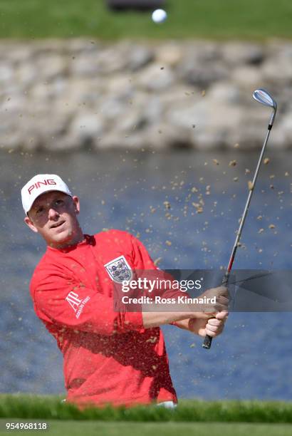 Matt Wallace of England plays a bunker shot on the 6th hole during Day One of the GolfSixes at The Centurion Club on May 5, 2018 in St Albans,...