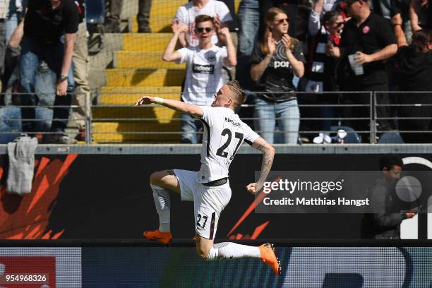 Marius Wolf of Frankfurt celebrates after he scored a goal to make it 1:0 during the Bundesliga match between Eintracht Frankfurt and Hamburger SV at...