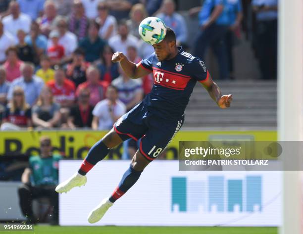 Munich's Franck Evina heads the ball during the German first division Bundesliga football match FC Cologne vs FC Bayern Munich in Cologne, western...