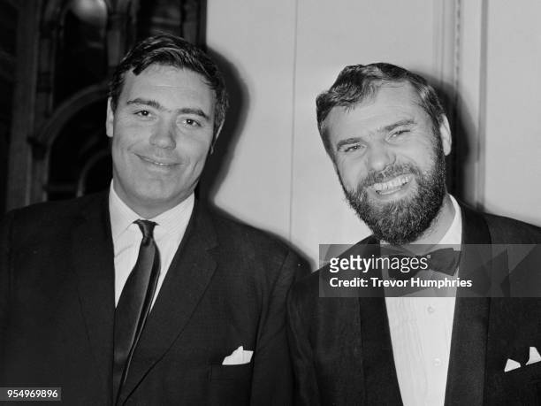 English comedy scriptwriting duo Galton And Simpson - Ray Galton and Alan Simpson - arrive at the gala European charity premiere of 'The Great Race'...