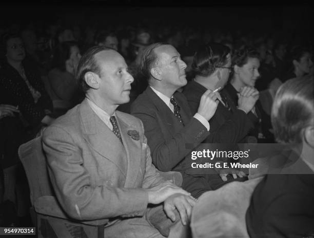 Manning Sherman , composer of 'A Nightingale Sang in Berkeley Square', and playwright Noël Coward in the audience at the Saville Theatre, London,...
