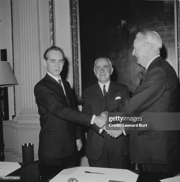 From left to right, Mikhail Smirnovsky, the Soviet Ambassador to the UK, British Foreign Secretary Michael Stewart and David K. E. Bruce , the US...