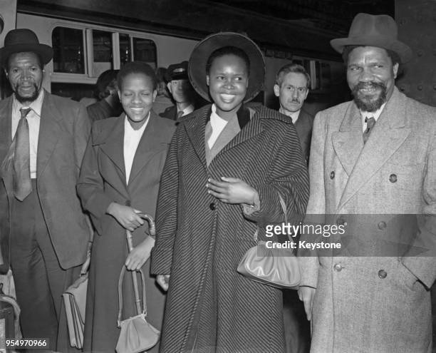 Sobhuza II , the Paramount Chief of Swaziland, arrives at Waterloo Station in London with his wife Lomakolwa Nkosi to attend the coronation of Queen...
