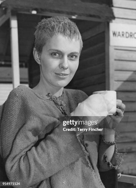 American actress Jean Seberg at Shepperton Studios, UK, during the filming of George Bernard Shaw's play 'Saint Joan', 22nd February 1957. Her hand...