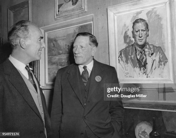 Field Marshal Sir Claude Auchinleck of the British Army looks at a painting of himself by English artist Major Edward Seago, RBA , after the latter...