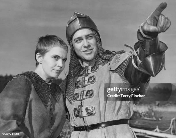 American actress Jean Seberg as Joan of Arc and Richard Todd as Dunois during the filming of George Bernard Shaw's play 'Saint Joan', at Frensham...