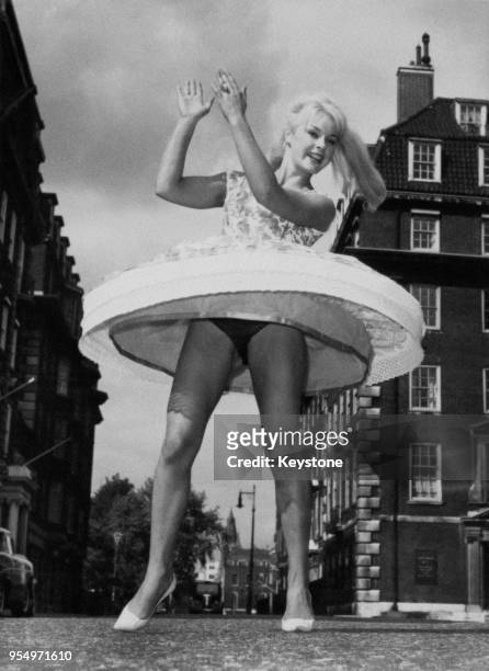 German actress Elke Sommer after her arrival in London, 4th September 1960. She is in the UK to work on the film 'Don't Bother to Knock'.
