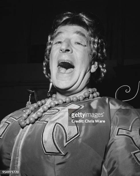 British comedian Ronald Shiner at the London Coliseum, where he is preparing for his role as Widow Twankey in the pantomime 'Aladdin', 4th November...