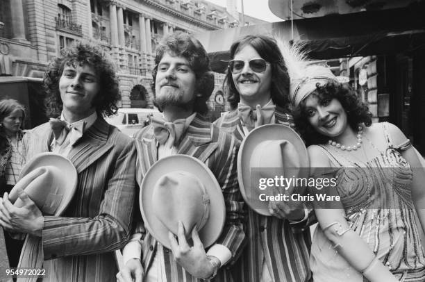 English folk group The Settlers pose on Regent Street in London during a press reception at the Cafe Royal to mark the launch of their record 'Top of...