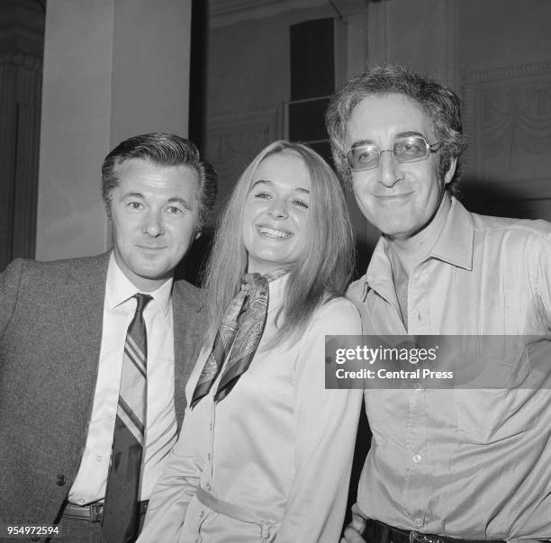 From left to right, producer Bryan Forbes, actress Sinéad Cusack and actor Peter Sellers at a press conference held by the Associated British Picture...