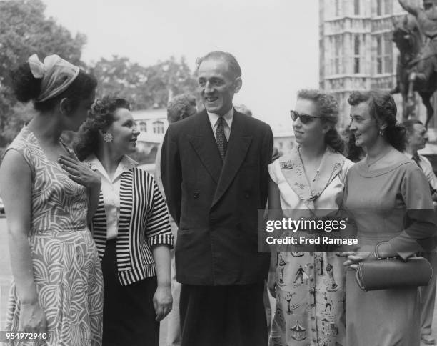 British Labour politician Julius Silverman , the MP for Birmingham Aston, shows members of the Moscow Arts Theatre Company around the House of...