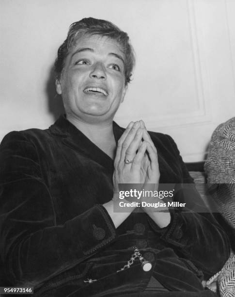 French actress Simone Signoret at the Savoy Hotel in London, 26th August 1957. She is in the capital to attend the opening of her latest film 'Les...