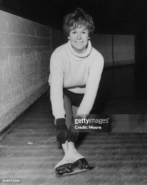 British figure skater Sally-Anne Stapleford begins a training session at Streatham in London, 6th November 1964. She is preparing to defend her title...