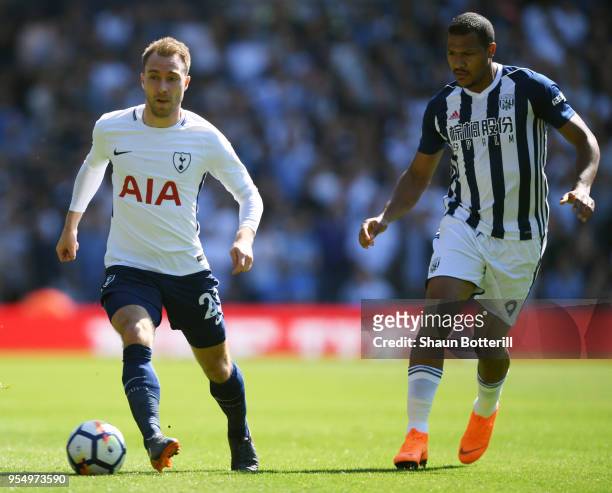 Christian Eriksen of Tottenham Hotspur and Jose Salomon Rondon of West Bromwich Albion battle for the ball during the Premier League match between...