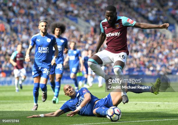 Yohan Benalouane of Leicester City tackles Arthur Masuaku of West Ham United during the Premier League match between Leicester City and West Ham...