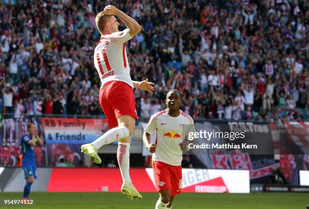 Timo Werner of Leipzig jubilates with team mate Ademola Lookman after scoring the second goal during the Bundesliga match between RB Leipzig and VfL...