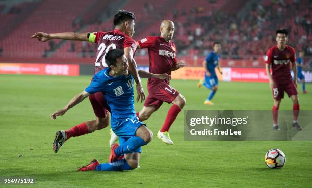 Zhang Chengdong of Hebei China Fortune and Wang Fei of Henan Jiany in action during 2018 Chinese Super League match between Hebei China Fortune adn...