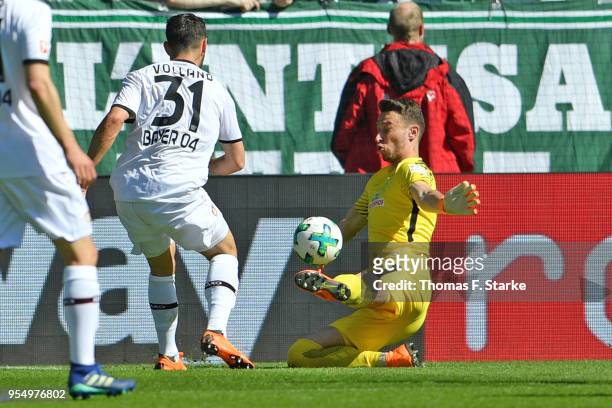 Goalkeeper Jiri Pavlenka of Bremen saves a kick by Kevin Volland of Leverkusen during the Bundesliga match between SV Werder Bremen and Bayer 04...