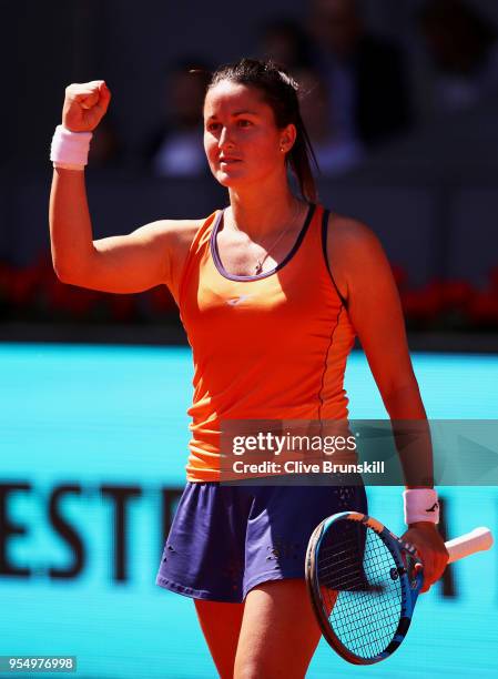 Lara Arruabarrena of Spain celebrates match point against Marta Kostyuk of the Ukraine in their first round match during day one of the Mutua Madrid...