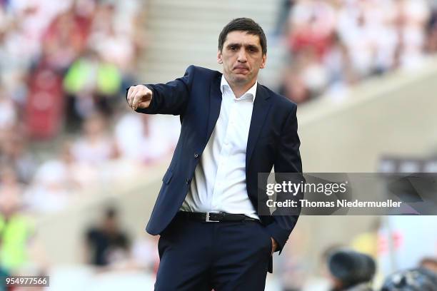 Tayfun Korkut, head coach of Stuttgart gestures during the Bundesliga match between VfB Stuttgart and TSG 1899 Hoffenheim at Mercedes-Benz Arena on...