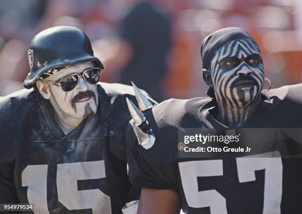 Oakland Raiders fans complete with make up support their team during the American Football Conference West game against the Seattle Seahawks on 8...