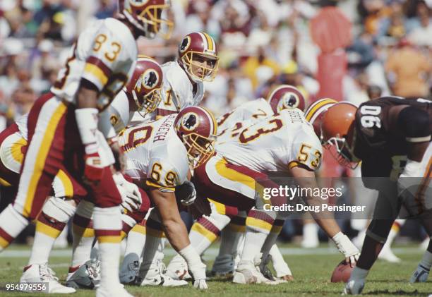 Mark Rypien Quarterback for the Washington Redskins calls the play on the line of scrimmage during the National Football Conference East game against...