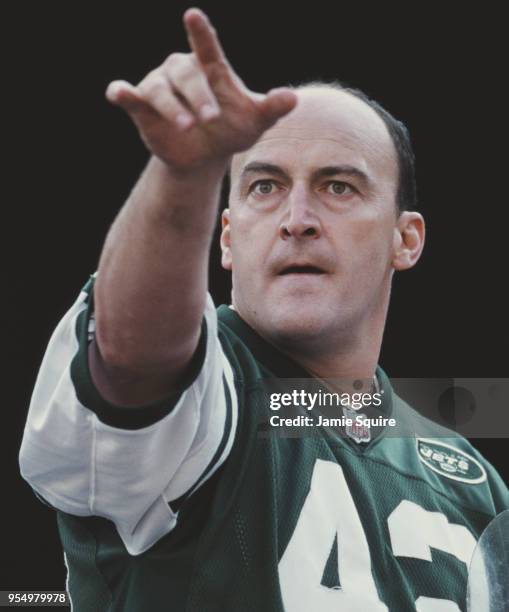 New York City firefighter and superfan for the New York Jets, Fireman Edwin M. Anzalone better known as Fireman Ed leads the J-E-T-S chant from...