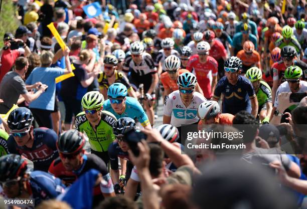 Riders in the peloton climb up the iconic Sutton Bank during the third stage of the Tour de Yorkshire cycling race on May 5, 2018 in Thirsk, United...