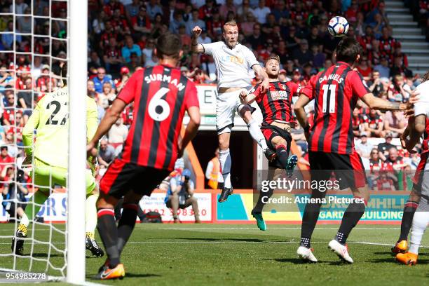 Mike van der Hoorn of Swansea City heads the ball towards goal during the Premier League match between AFC Bournemouth and Swansea City at Vitality...