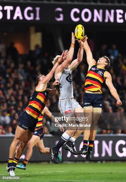 Tom Doedee of the Adelaide Crows spoils Andrew Phillips of the Blues during the round seven AFL match between the Adelaide Crows and the Carlton...