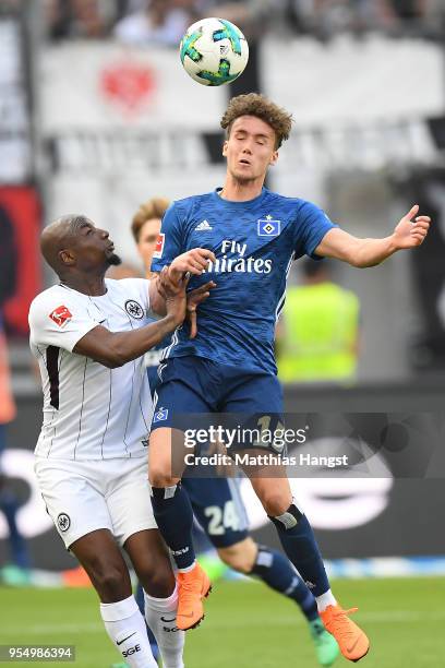 Jetro Willems of Frankfurt flights for the ball with Luca Waldschmidt of Hamburg during the Bundesliga match between Eintracht Frankfurt and...