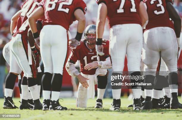 Trent Dilfer, Quarterback for the Tampa Bay Buccaneers in the huddle with his offensive line during the National Football Conference Central game...