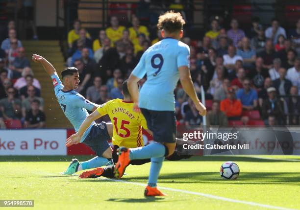 Ayoze Perez of Newcastle United shoots and scores his side's first goal during the Premier League match between Watford and Newcastle United at...