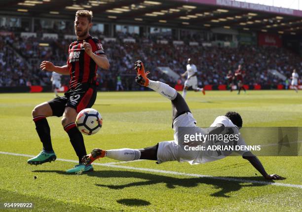Bournemouth's English defender Simon Francis vies with Swansea City's English midfielder Nathan Dyer during the English Premier League football match...