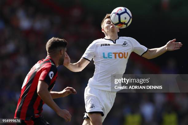 Swansea City's English midfielder Tom Carroll controls the ball during the English Premier League football match between Bournemouth and Swansea City...