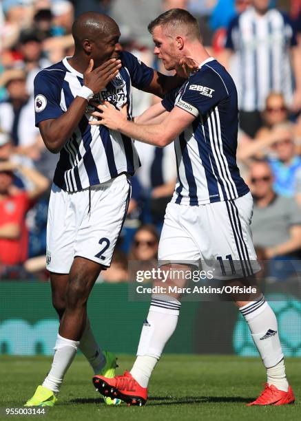 Chris Brunt of West Bromwich Albion tries to restrain team mate Allan Nyom during the Premier League match between West Bromwich Albion and Tottenham...