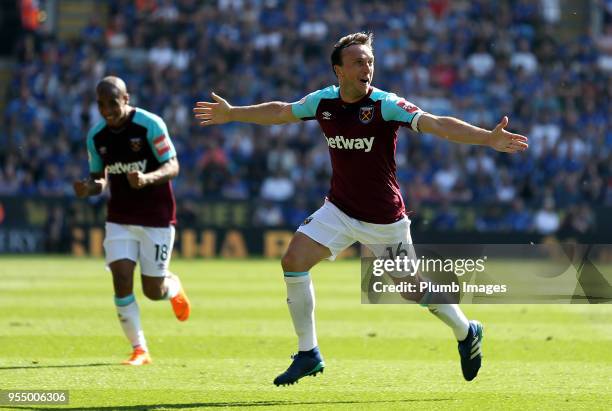 Mark Noble of West Ham United celebrates after scoring to make it 0-2 during the Premier League match between Leicester City and West Ham United at...