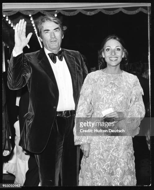 Actor gregory peck and his wife, veronique passani Actor Gregory Peck and his wife, Veronique Passani, attending the premiere of the new James Bond...