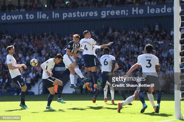 Gareth McAuley of West Bromwich Albion and Toby Alderweireld of Tottenham Hotspur in action from a corner during the Premier League match between...