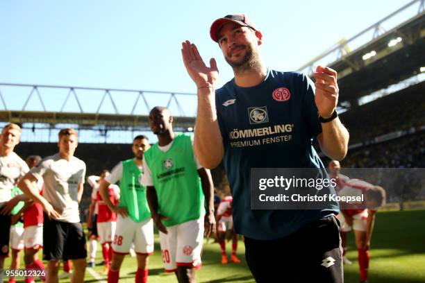 Head coach Sandro Schwarz of Mainz celebrates the 2-1 victory and avoiding the relegation after the Bundesliga match between Borussia Dortmund and 1....