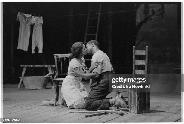 Porgy and bess kissing, Porgy sings the duet "You is my woman now" with Bess in Act II, Scene I of the opera Porgy and Bess Glyndebourne, England, UK.