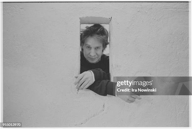 Opera director peter sellars, Director Peter Sellars looks through an opening in the stage set of the new opera The Electrification of the Soviet...