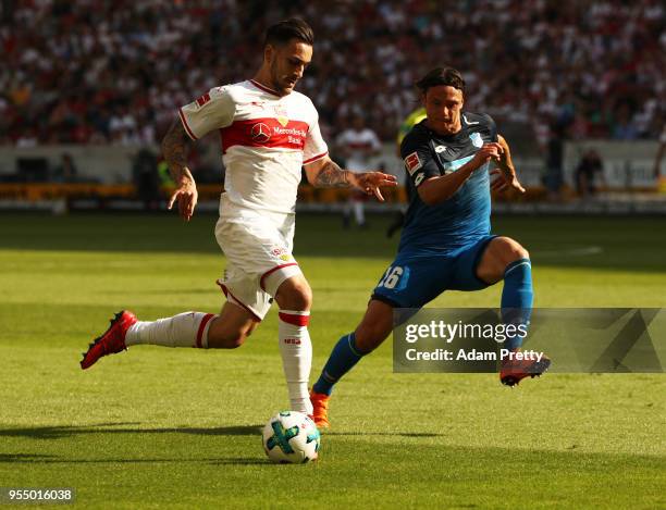 Anastasios Donis of VfB Stuttgart is challenged by Nico Schulz of 1899 Hoffenheim during the Bundesliga match between VfB Stuttgart and TSG 1899...