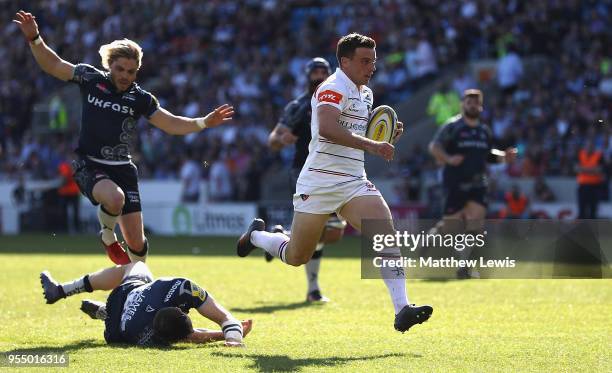 George Ford of Leicester Tigers breaks clear of the Sale defence to score a try during the Aviva Premiership match between Sale Sharks and Leicester...