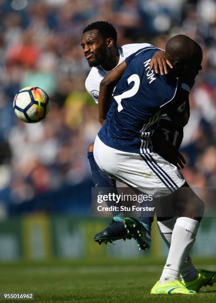 Player Allan Nyom challenges Danny Rose of Spurs during the Premier League match between West Bromwich Albion and Tottenham Hotspur at The Hawthorns...