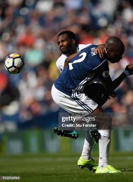 Player Allan Nyom challenges Danny Rose of Spurs during the Premier League match between West Bromwich Albion and Tottenham Hotspur at The Hawthorns...